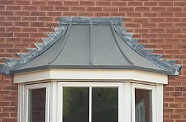 This pre fabricated GRP bay window roof canopy is easy to install over a new or existing bay window and is supplied fully insulated.