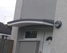 Wentworth Plastics Large Shallow Arched GRP Door Canopy.