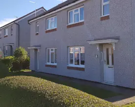 Single Georgian GRP door canopy installed on an EWI-refurbished property